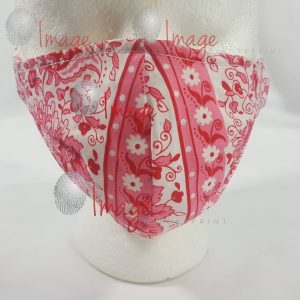 IF-5640 African Print Face Mask plenty logos African Print Face Mask on Mannequin – Vibrant Pink Pattern (Royalty-Free Stock Photo)