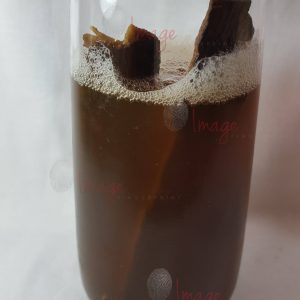 Glass of Mauby 2nd version A Tall Glass Of Traditional Mauby Drink